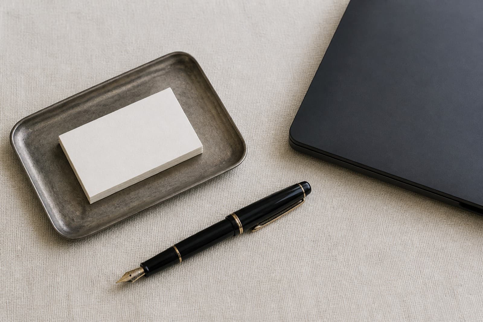 Tray with cards and a pen